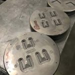 Usine Novellini : les matrices permettant de former les profilés d'aluminium