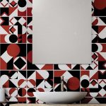 Carrelage tendance géométrie : en noir, blanc et rouge.