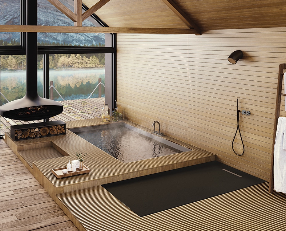 bain japonais fumant encastré dans une ambiance en bois
