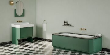 meuble rétro vert et baignoire dans un caisson vert