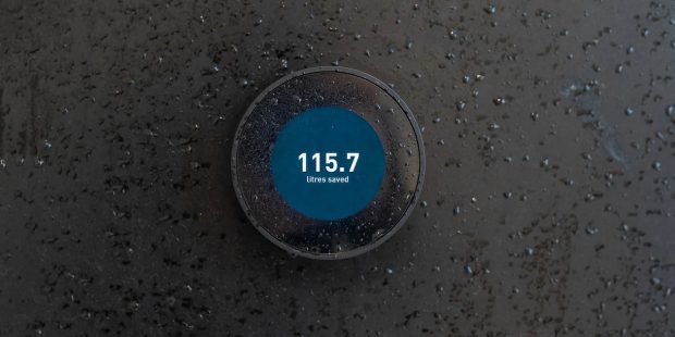 Ecran rond indiquant le volume d'eau économisé par Orbital Systems