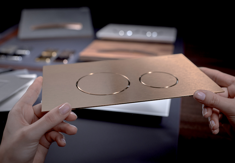 Plaque de commande de chasse en acier inox Sigma40 de Geberit.