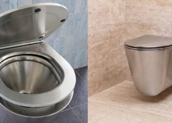 Abattant en inox sur cuvette WC en inox.